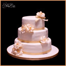 white and golden wedding cake