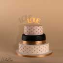 wedding cake black white and gold